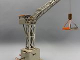 a toy crane that is sitting on top of a table