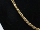 a gold chain necklace on a mannequin mannequin mannequin mannequin mannequin mannequin mannequin mannequin manne
