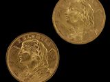 deux souverains d'or, dont l'un représente une femme et l'autre un homme
