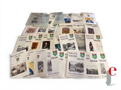 a pile of books with pictures on them sitting on a table