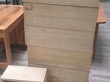 several pieces of furniture sitting on top of a hard wood floor