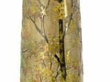 a gold vase with a tree on it on a white background