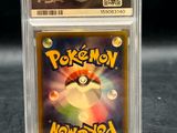 a close up of a pokemon card in a clear case