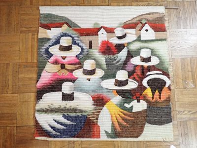 a rug with a picture of a group of people on it
