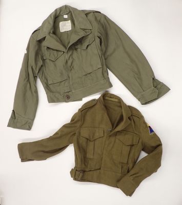 an image of a green jacket and a brown jacket on a white surface
