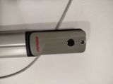 a close up of a cell phone on a table