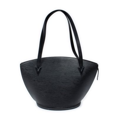 a black handbag on a white background with a black handle