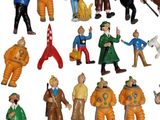 many figurines of people in different styles and colors