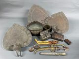 a lot of silver items that are on a table