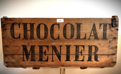 une pancarte en bois sur laquelle est écrit « chocolat menter »
