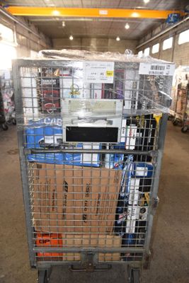 a shopping cart with a microwave on top of it