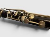 a close up of a musical instrument on a white surface