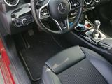 the interior of a car with a steering wheel, dashboard, and dash board