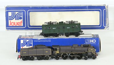 a toy train that is sitting next to a box