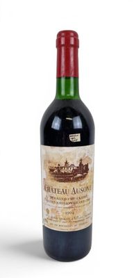 a bottle of wine that is sitting on a table
