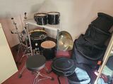 a lot of drums and drums in a room