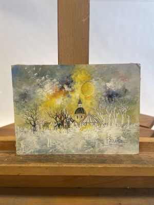 an oil painting of a church in the snow on a wooden easel