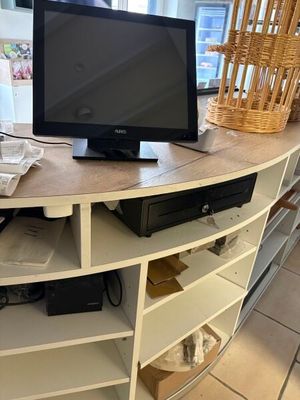 a television sitting on top of a table in a room