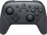a close up of a controller on a white background