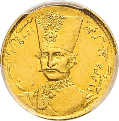 a close up of a gold coin with an image of a man wearing a hat