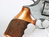 a close up of a gun on a white background
