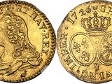 a gold coin with a crown on the front and a crown on the back