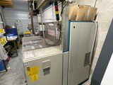 a machine that is sitting inside of a building