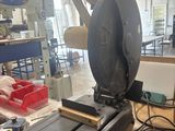 an image of a workbench in a workshop with a lot of tools