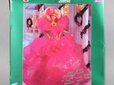 the barbie doll is in the box on the table