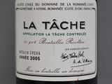 a bottle of wine that is on a table