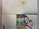 two books that are sitting on top of a table