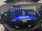 a close up of a display on a motorcycle ' s dashboard