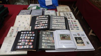 a table that has a bunch of stamps on it