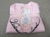a pink robe that has the name of a woman on it