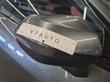 a sticker on the side mirror of a car