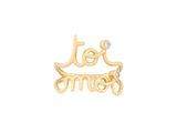 a close up of a gold ring with the word love and a diamond
