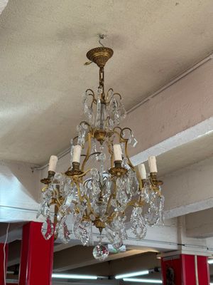 a chandelier hanging from the ceiling in a store