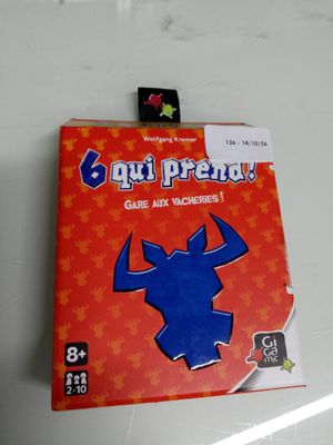 a card game with a picture of a blue bull on it