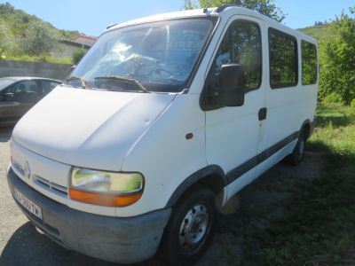 a white van that is parked in a parking lot