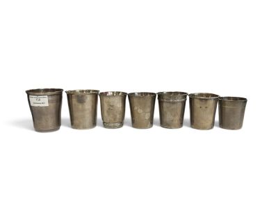 a set of six silver cups with handles on each side