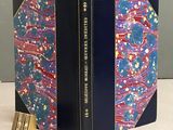 an image of a book with a bookmark on top of it and a book in the middle of the book