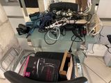 a chair that has a bunch of hair dryers on it