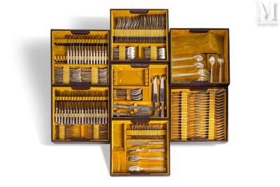 a wooden box with silverware in it on a white surface