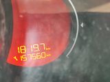 a digital clock on the back of a bus