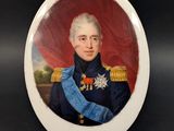 portrait of a man in a military uniform in a white oval frame