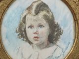 painting of a young girl in a gold frame with a blue background