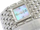 a silver watch with a mother of pearl dial on it