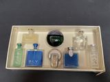 a box of perfumes that are sitting on a table