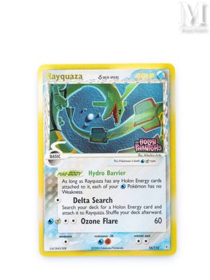a close up of a pokemon card on a white surface