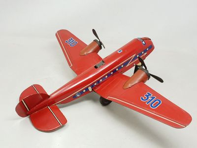 MEMO 310 (Paris, v.1950) avion bi-hélice en tôle lithographi…